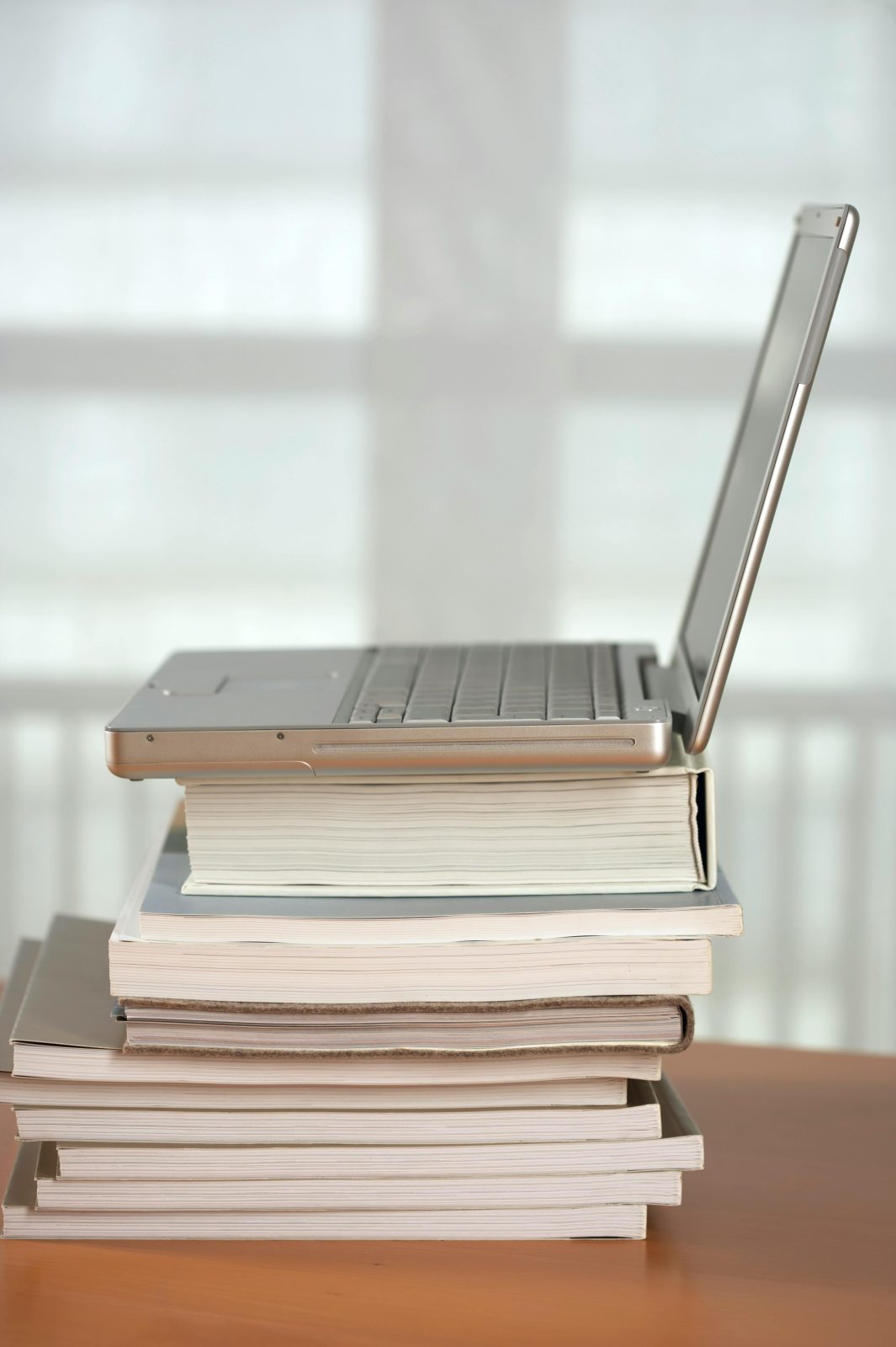 Still Stacking Books Under Your Laptop or Monitor? Let’s Talk.